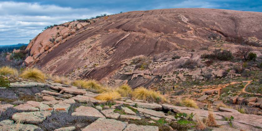 a landscape shot of enchanted rock in texas
